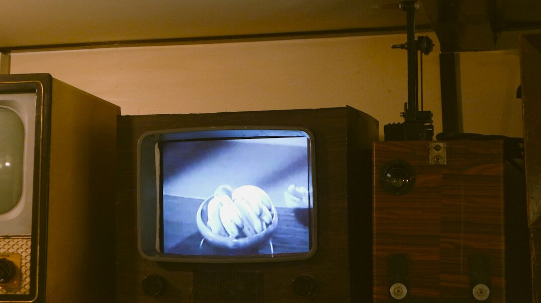 family watching vintage tv